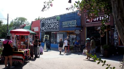 People walk around Little Five Points on a Sunday afternoon during Little Five Points Atlanta Arts Alive.