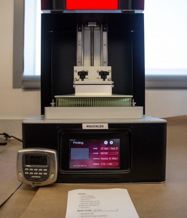 A 3D printer nicknamed "Knuckles" is one of the 3D printers churning out hundreds of nasal swabs at the Dental College of Georgia at Augusta University in Augusta, Ga.