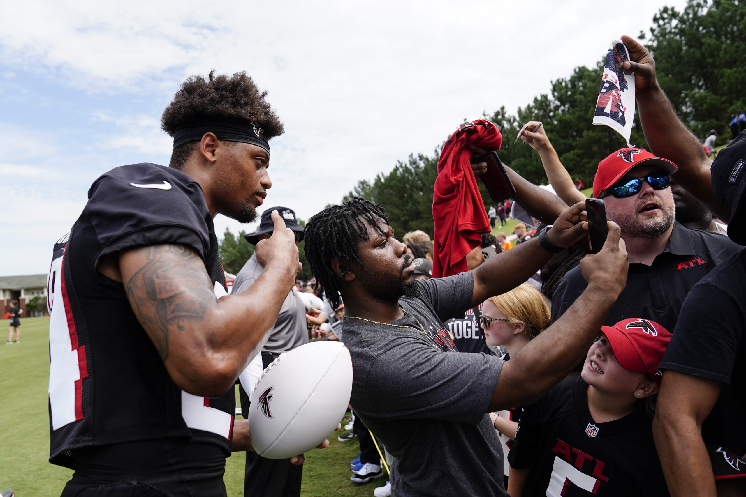 Falcons open camp with low expectations, open positions – WABE