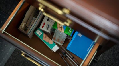 Drawer rilled with bandages and medications