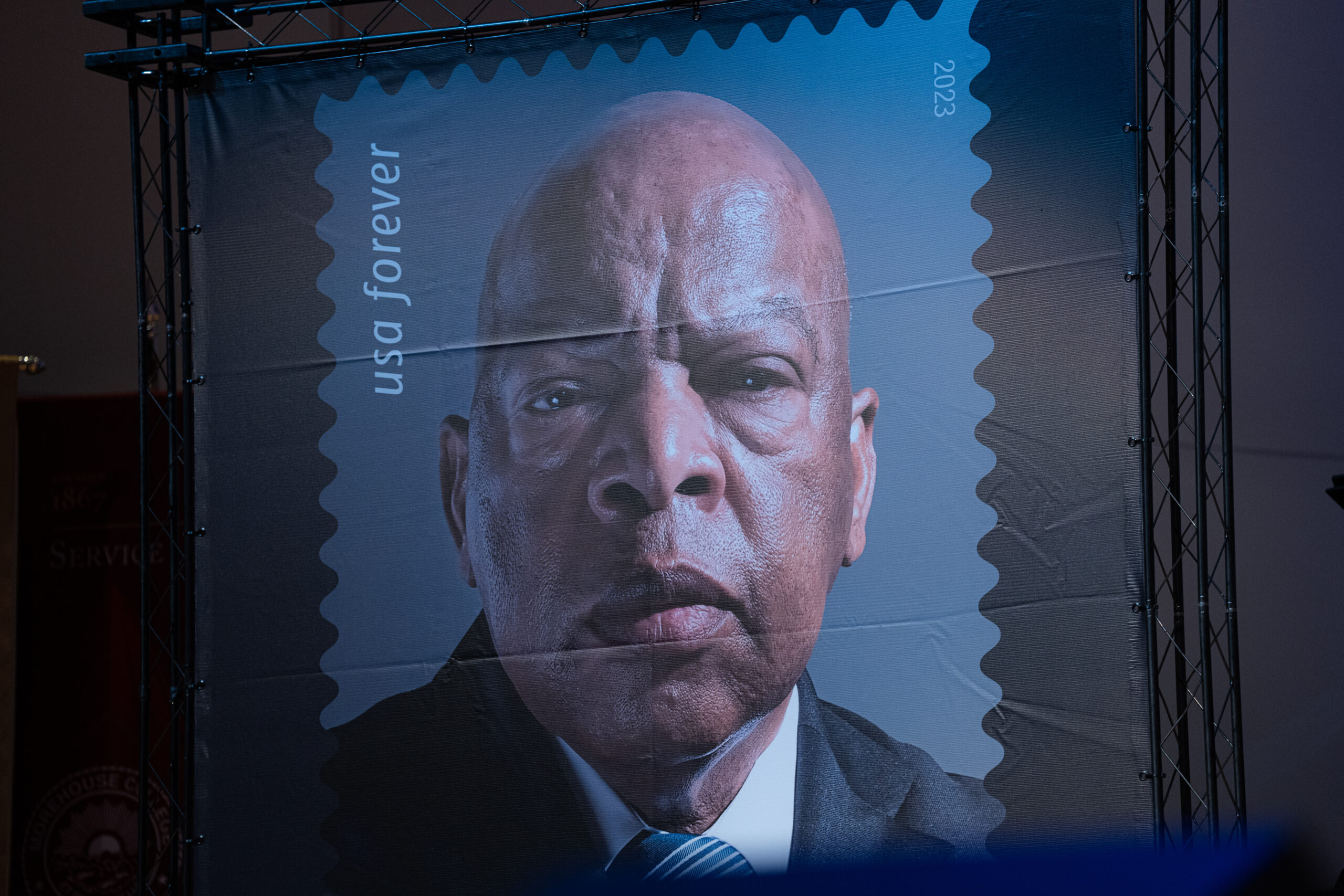 Who are other Georgians that John Lewis joins on U.S. stamps?