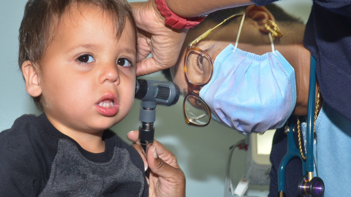 KINGS BAY, Ga. (July 12, 2021) - Andrea Thaxton, a pediatrician at Naval Branch Health Clinic Kings Bay, examines a two-year-old. (U.S. Navy photo by Deidre Smith, Naval Hospital Jacksonville/Released).