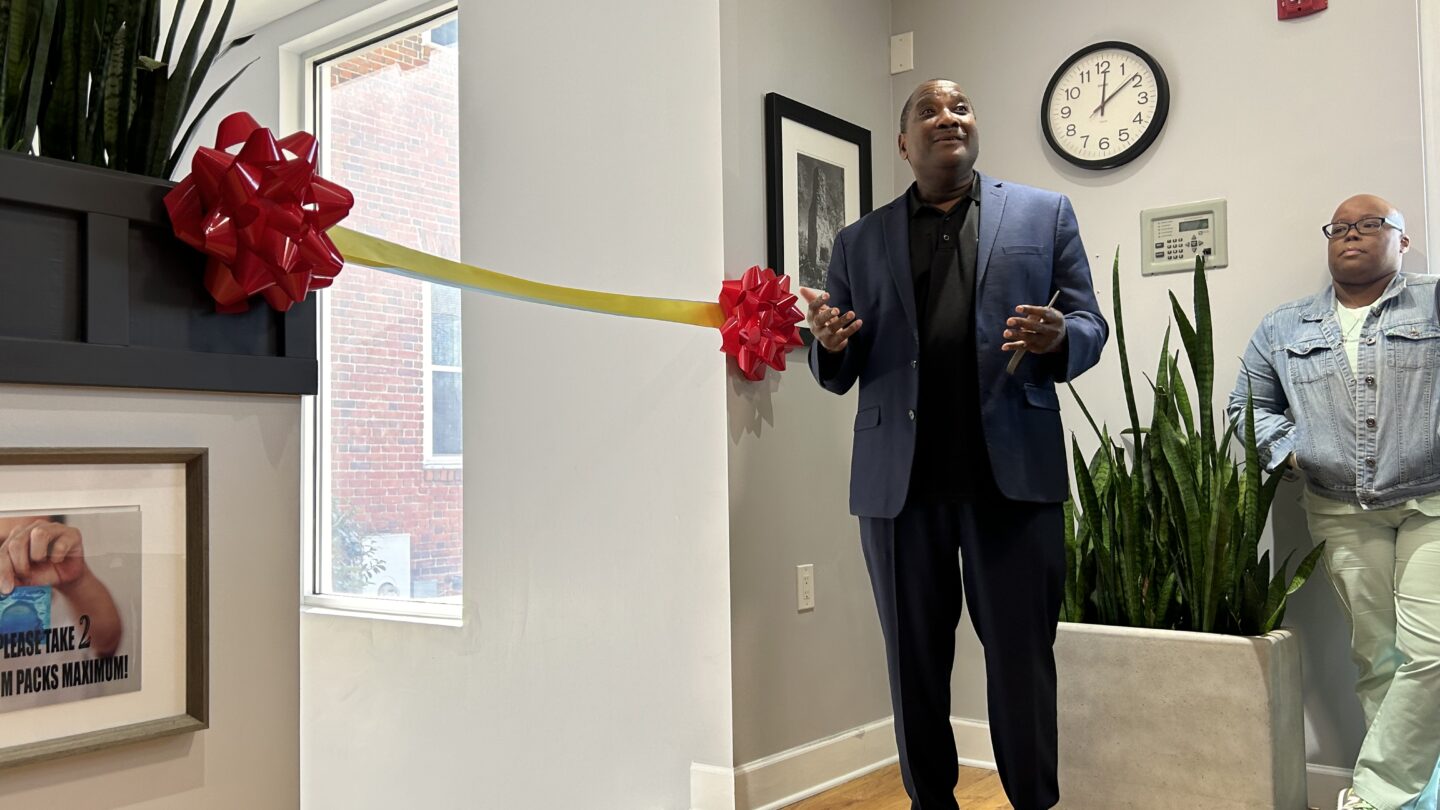 Man in front of Ribbon