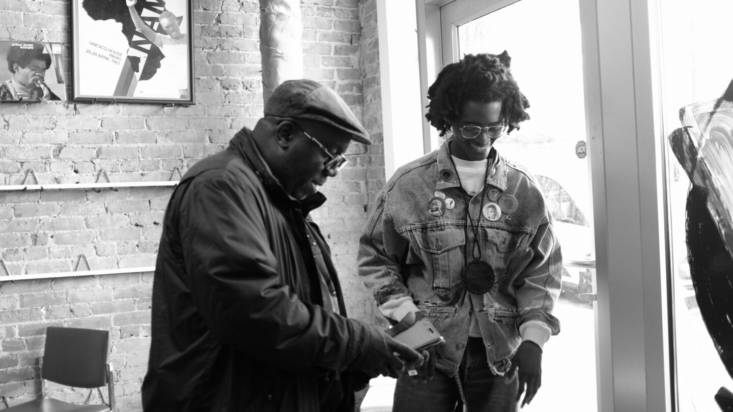 Two men chatting in store