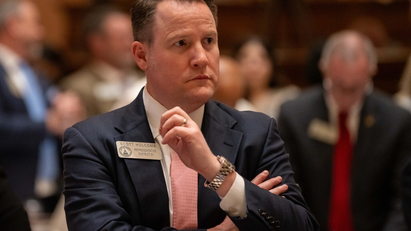 Man in suite with badge