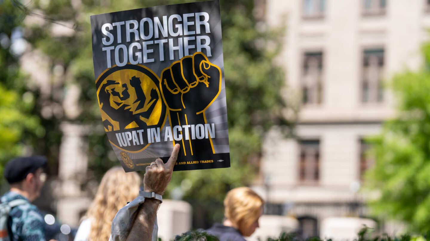 Activist holding sign