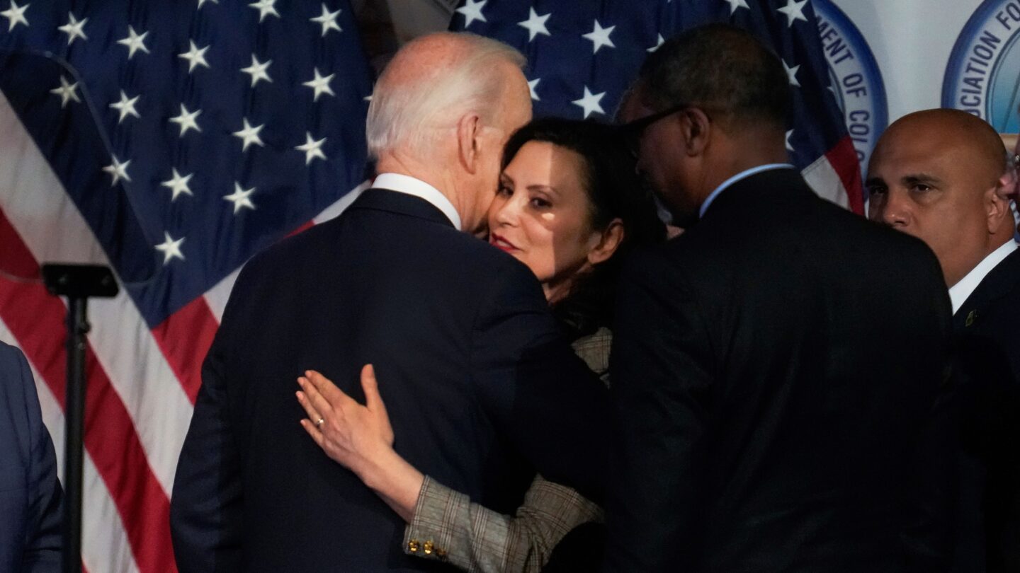 President Joe Biden hugs Gov. Gretchen Whitmer