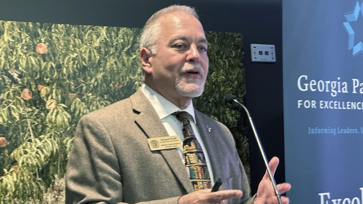 Georgia Superintendent of Schools Richard Woods speaks at a podium.