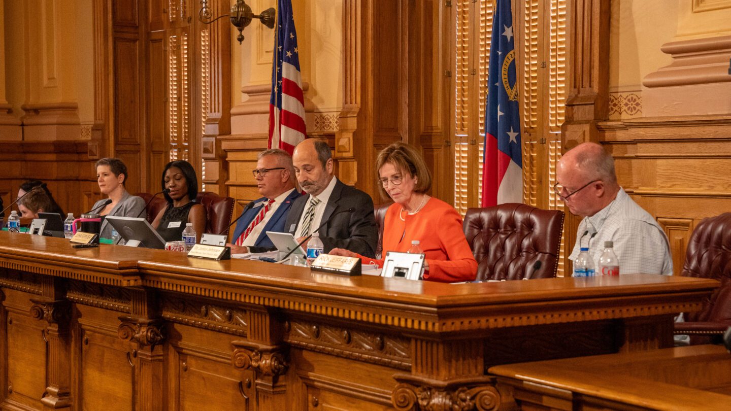 Members of the Georgia State Election Board attend a meeting.