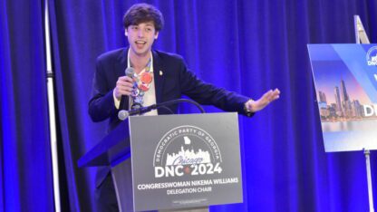 Parker Short speaks to the Georgia delegation at the Democratic National Convention.