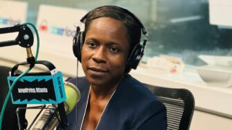 Shannon Manigault sits in the WABE studio.