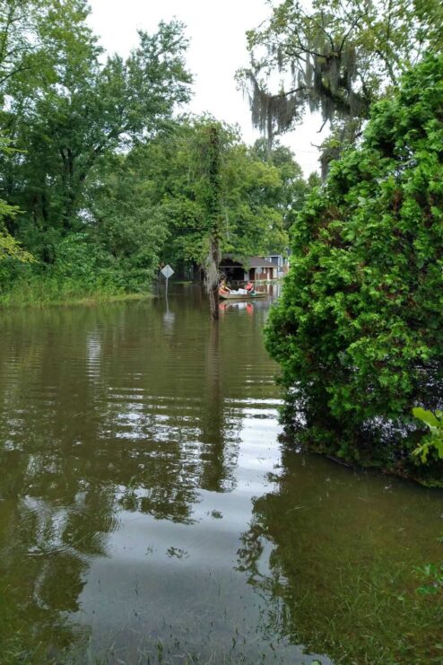 A resident of Savannah's Tremont Park neighborhood is rescued from the catastrophic flooding caused by Tropical Storm Debby.