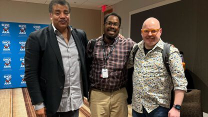 Shot in the Arm executive producer Neil deGrasse Tyson, left, poses with 