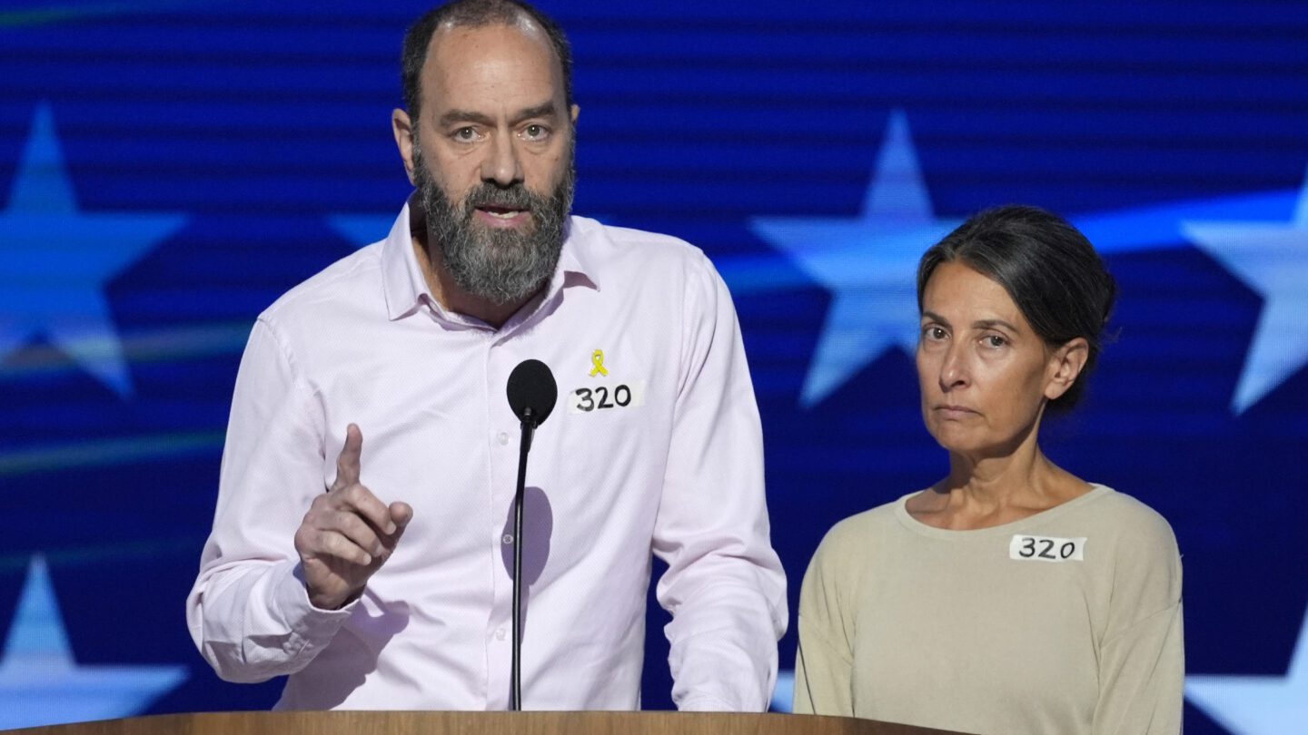 Jon Polin, left, and Rachel Goldberg, parents of Hersh Goldberg-Polin, speak on stage during the Democratic National Convention Wednesday, Aug. 21, 2024, in Chicago.