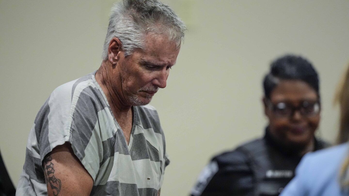 Colin Gray appears in the Barrow County courthouse. He looks toward the ground.