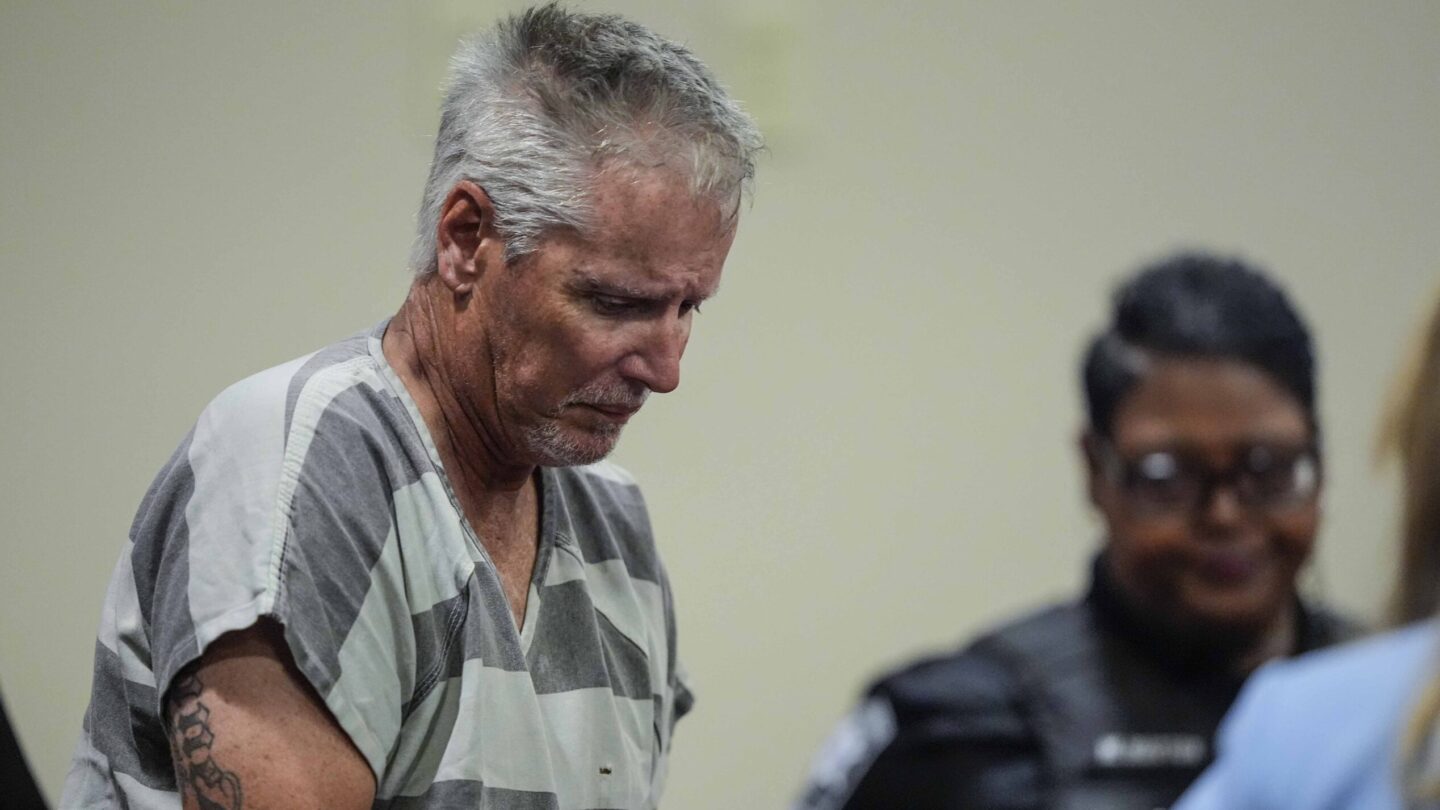 Colin Gray appears in the Barrow County courthouse. He looks toward the ground.