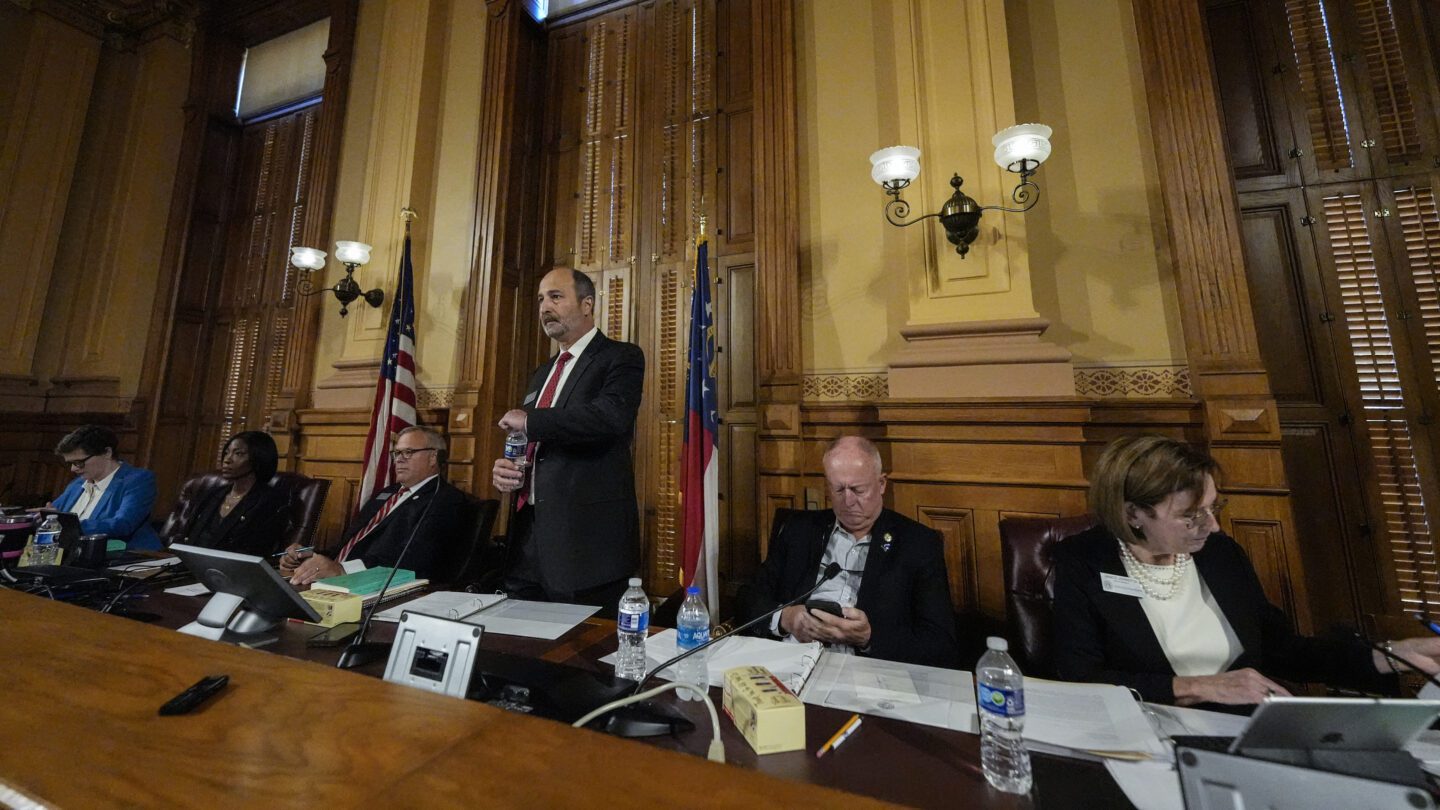 Georgia's State Election Board members discuss proposals for election rule changes at the state Capitol