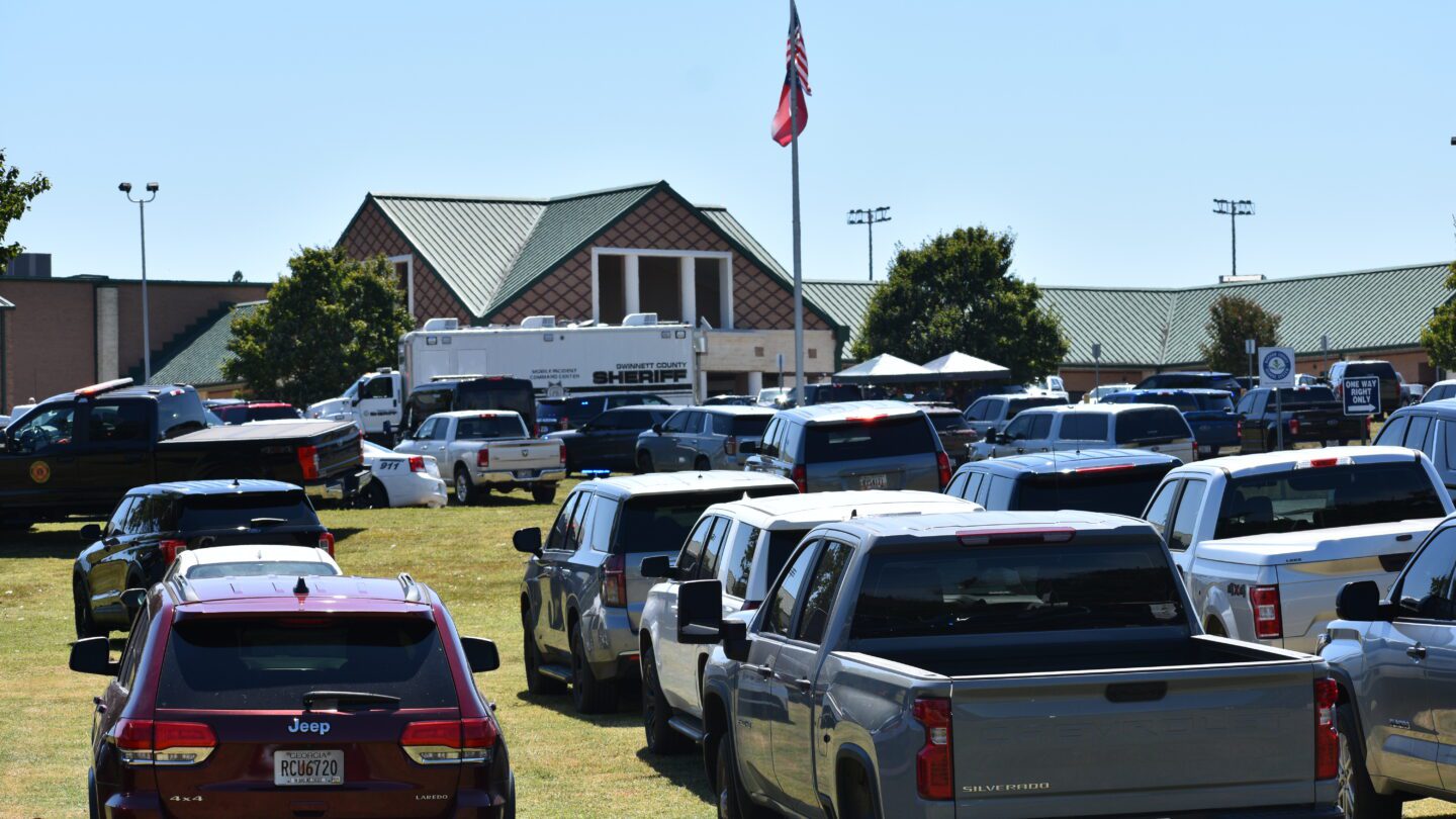 Cars are packed near Apalachee High School in Barrow County, Georgia, after a deadly shooting there.