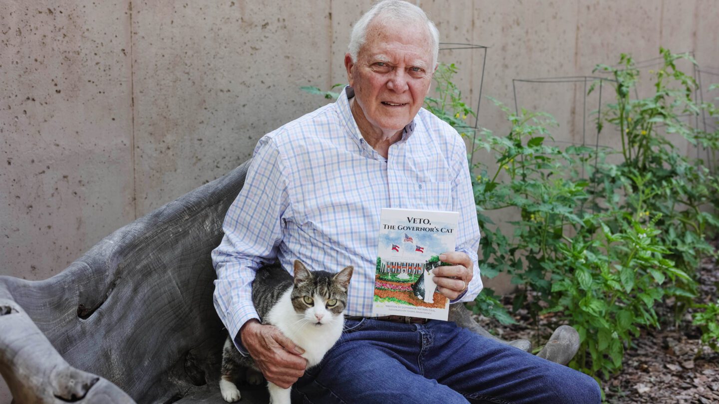 Nathan Deal poses with his cat.