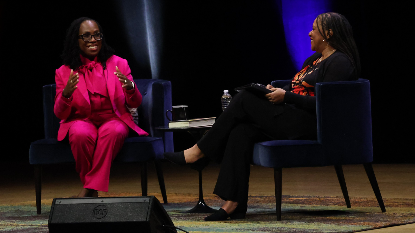 U.S. Supreme Court Justice Ketanji Brown Jackson, sitting left, talks with WABE's Rose Scott, right, on stage at the Atlanta Symphony Hall.