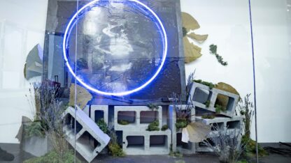 A ring of blue light around a collection of industrial materials