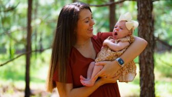 First-time mom Hannah Cabe holding her baby daughter. They live in one of Georgia’s maternity care desert counties, which lack OB-GYN providers or childbirth facilities. More than 40 percent of Georgia counties don’t have childbirth facilities or OB-GYN providers, according to the March of Dimes, and the number is growing. (WABE/Matthew Pearson)