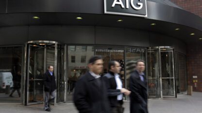 The AIG building in New York with two revolving doors.