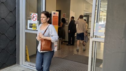 People entering and exiting the Buckhead Library for early in person voting.