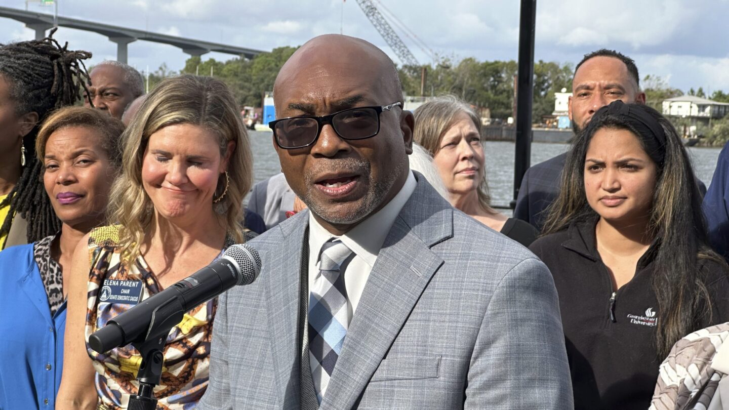 Georgia state Sen. Harold Jones of Augusta speaks at a news conference outdoors.